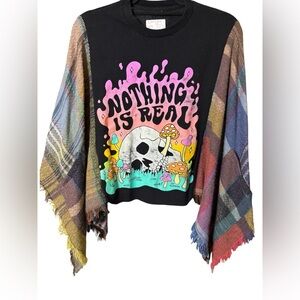 Graphic 'Nothing Is Real' Skull Rocktop